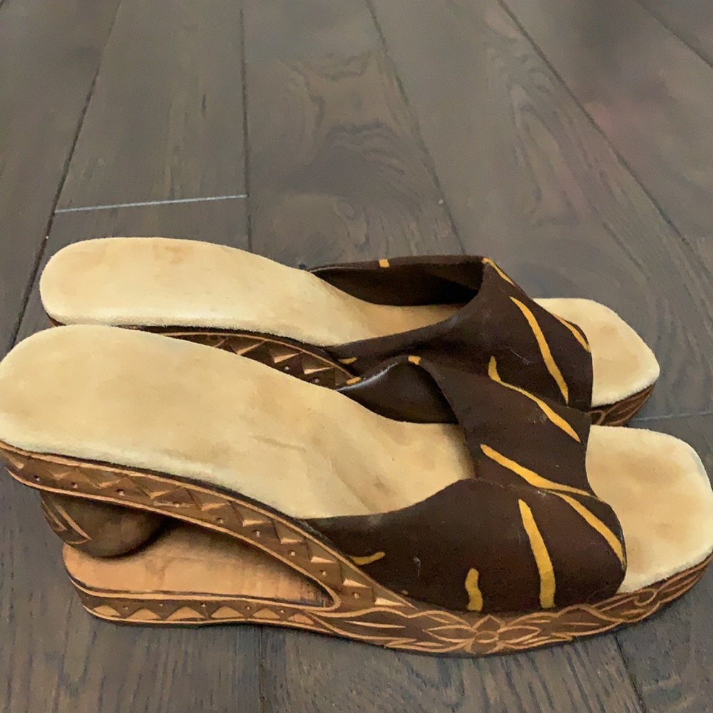 v i n t a g e :: handmade  Hand carved wood shoes